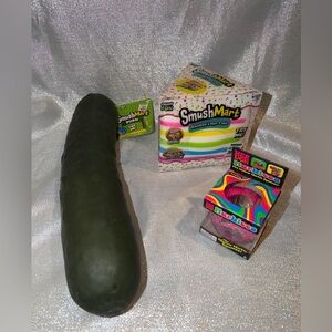 Set of SmushMart squishy toys:15" pickle, layer cake and the NeeDoh Marbleez.